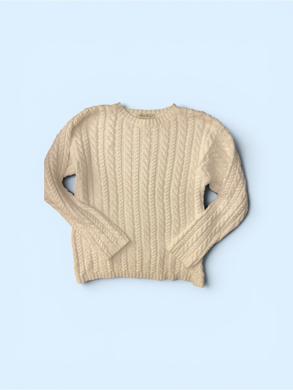 Vintage-inspired white classic cable knit Eddie Bauer sweater